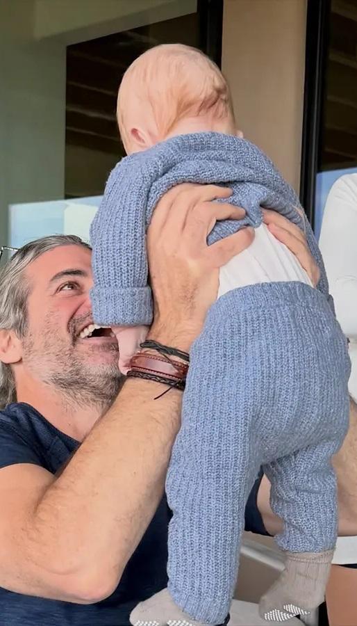 Джим Кертис с ребёнком