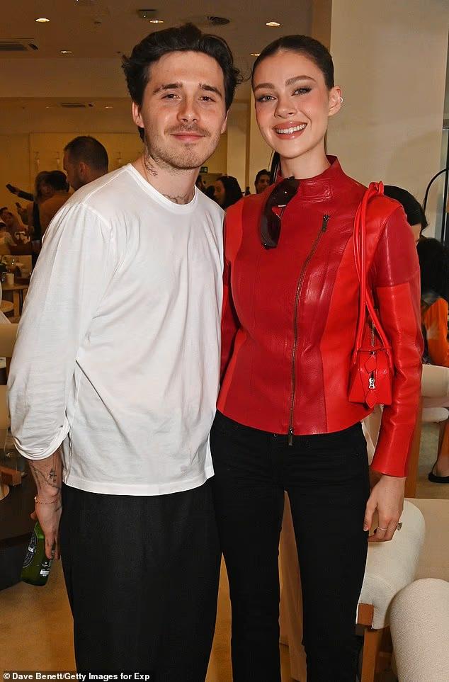 Бруклин Бекхэм и его жена